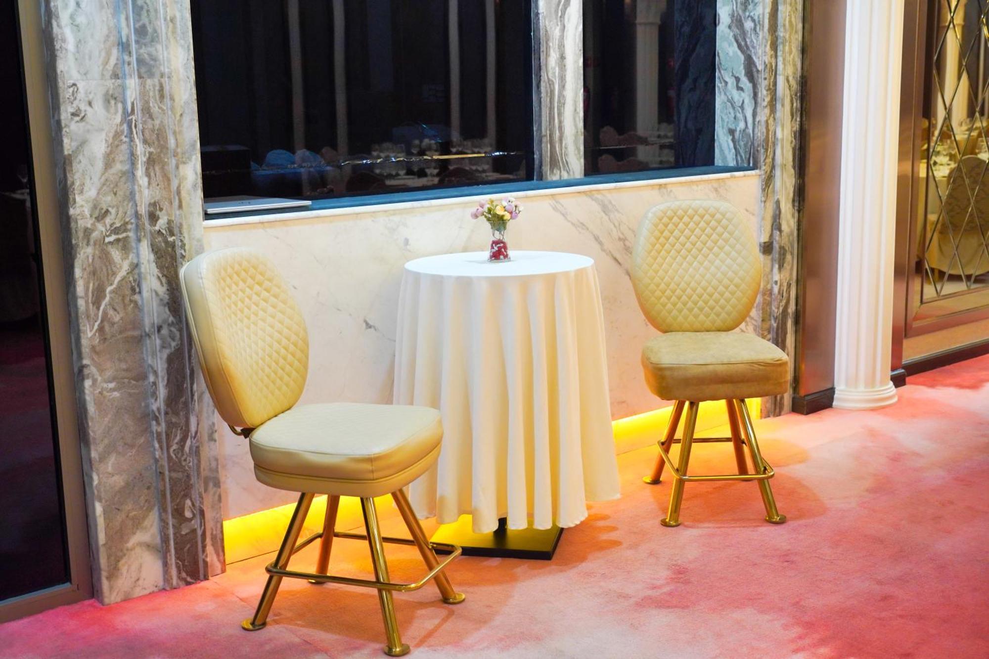 Best Western Premier Batumi Exterior photo A table and two chairs